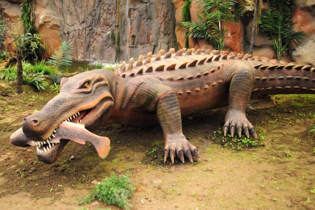 Sarcosuchus con pesce in bocca