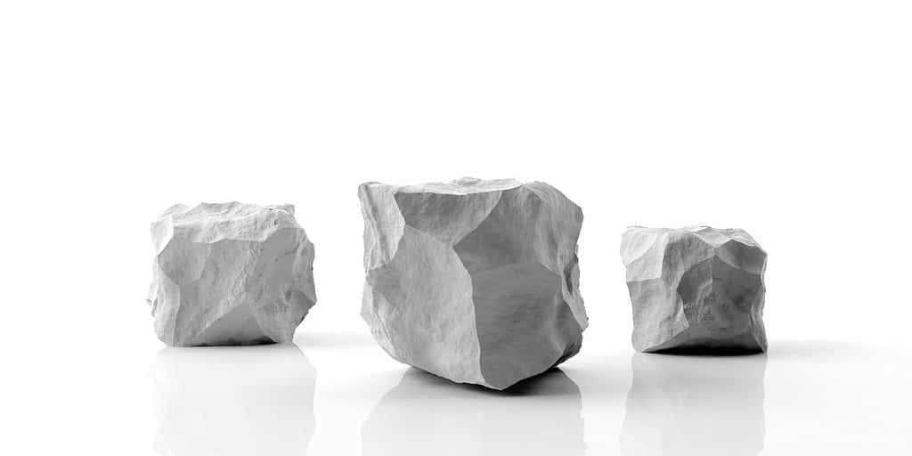 Podio di roccia in marmo bianco isolato su sfondo bianco