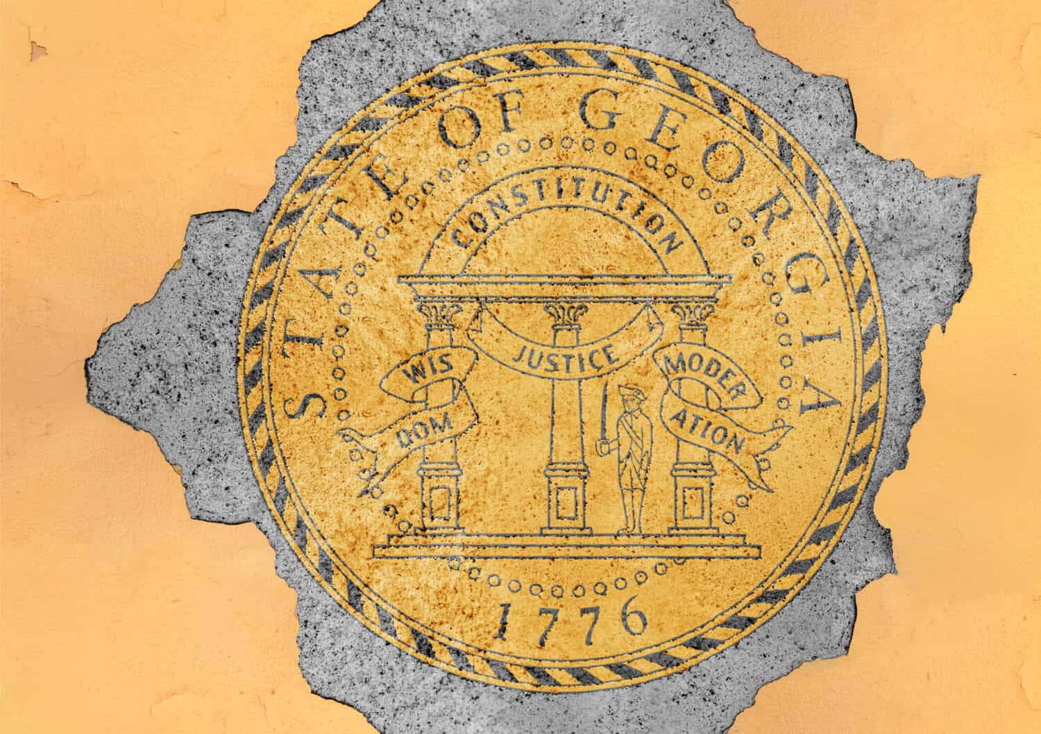 Bandiera del sigillo della Georgia dello stato degli Stati Uniti dipinta su foro di cemento e struttura della facciata della parete incrinata