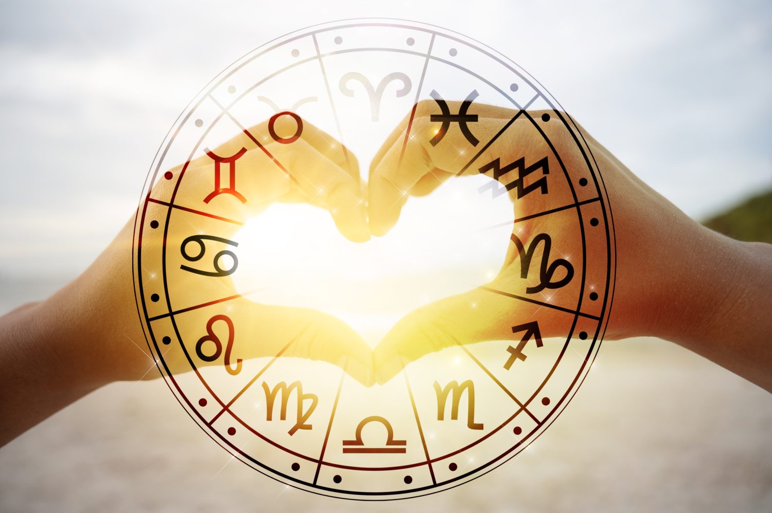 Le mani delle donne e degli uomini sono a forma di cuore con la luce del sole che passa attraverso le mani e hanno simboli astrologici